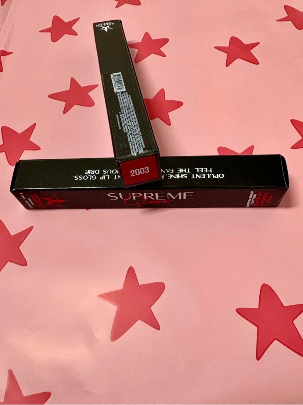 Jeffree Star Supreme Gloss 2003 (peachy orange-red)/ vanilla cupcake scent / NIB